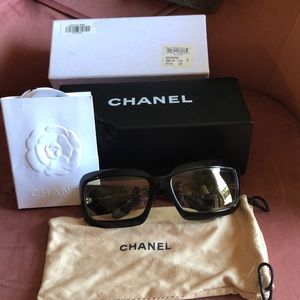 Chanel sunglasses, mother of pearl logo on sides.